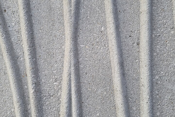 Textured Concrete Surface with Parallel Grooves for Architectural Design and Background Use