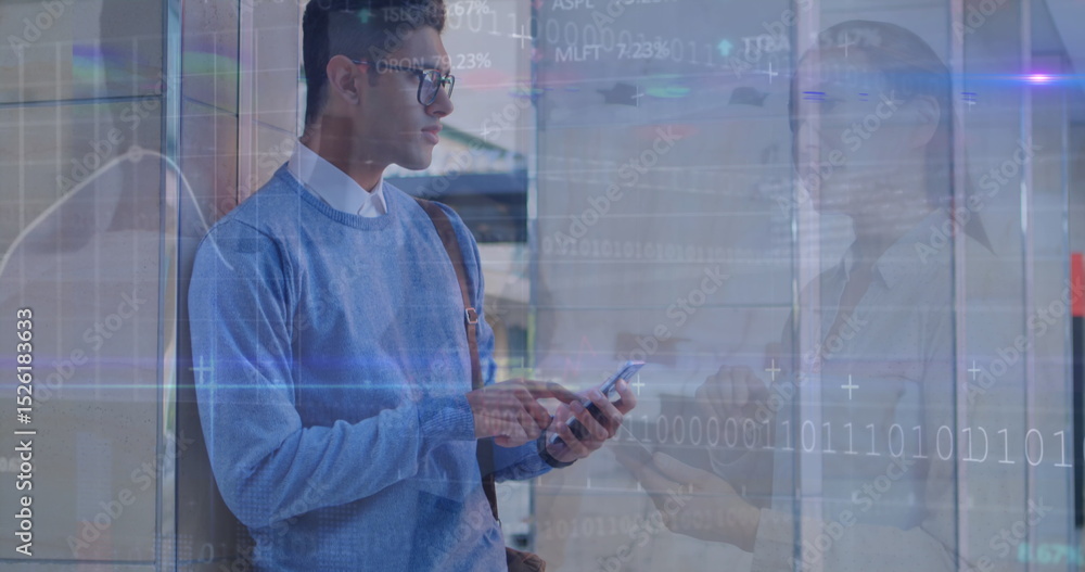 Poster image of binary data, coding, flare over man using cellphone and coworkers discussing in office