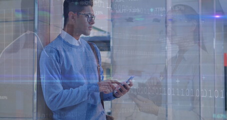 Image of binary data, coding, flare over man using cellphone and coworkers discussing in office