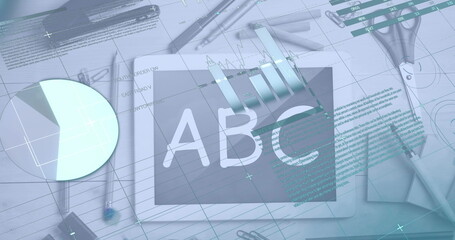 Image of infographic interface over digital tablet with abc on screen and stationery on table © vectorfusionart