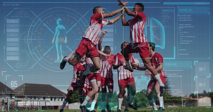 Image of screen with biological data over diverse male soccer players jumping with joy - Powered by Adobe
