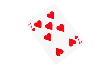 Fototapeta na wymiar Seven of Hearts Playing Card on Green Surface