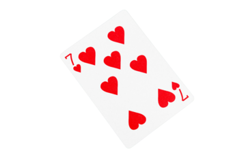 Seven of Hearts Playing Card on Green Surface