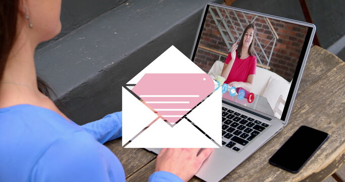 Image of email icon over caucasian woman on laptop image call