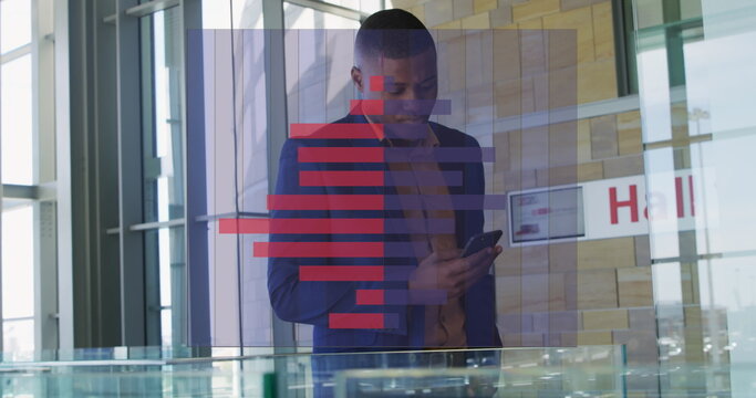 Image of data processing over african american businessman using smartphone