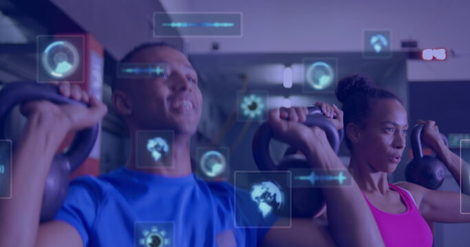 Image of data processing over couple exercising at gym - Powered by Adobe