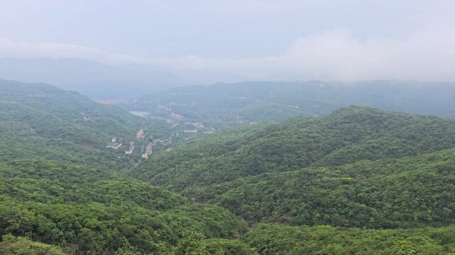 mountain landscape with fog, lavasa city 4k video