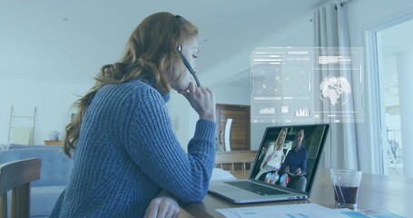 Image of infographic interface over caucasian businesswoman image conferencing on laptop