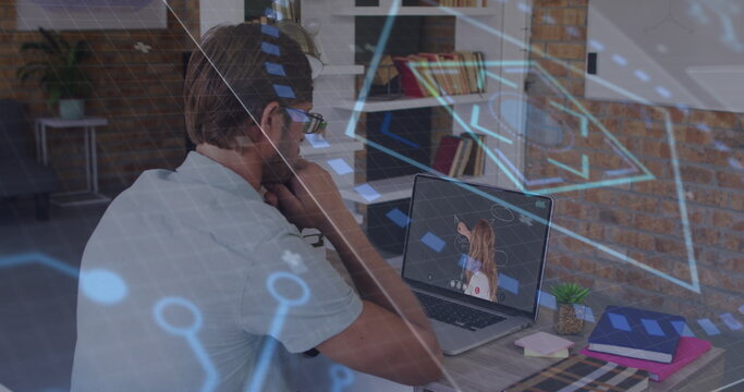 Image of network of connections over people working in warehouse