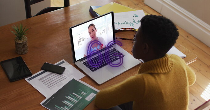 Image of 6g text and african american boy taking virtual classes from female tutor on laptop
