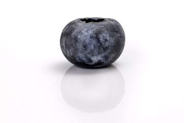 Fresh ripe whole blueberries on white background blue berry