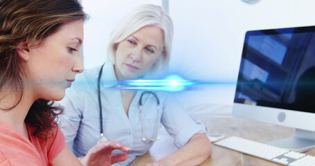 Digital composite image of blue light moving over caucasian doctor comforting patient at hospital