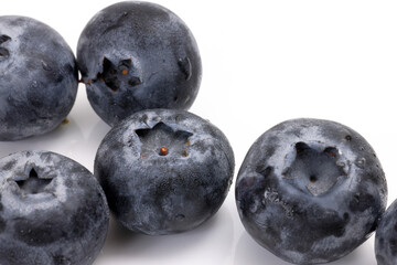 Fresh ripe whole blueberries on white background blue berry