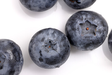 Fresh ripe whole blueberries on white background blue berry