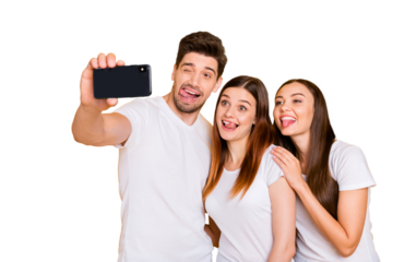 Portrait of three nice attractive lovely charming cheerful cheery playful comic childish person taking making selfie having fun fooling isolated over bright vivid shine yellow background