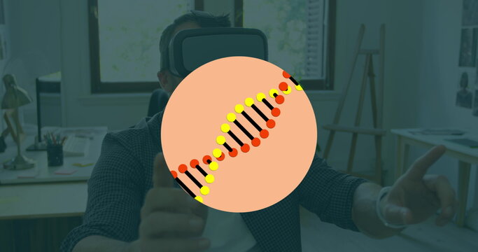 Image of dna structure spinning over caucasian man wearing vr headset at office - Powered by Adobe