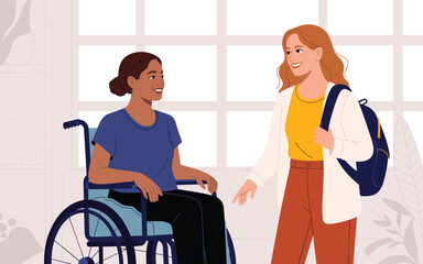 Two women having a friendly conversation, one in a wheelchair and the other seated on a stool in a cozy indoor setting
