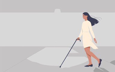 Stylish woman walking with cane in minimalist setting, symbol of elegance and mobility support

