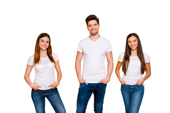 Portrait of charming people with long hair smiling putting hands in pockets wearing white t-shirt denim jeans isolated over yellow background