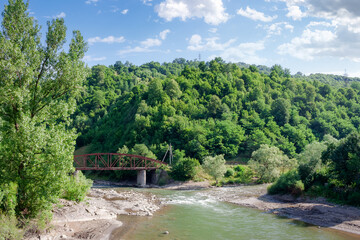 tisza river near rakhiv town. carpathian mountain landscape in summer. place where two stream join