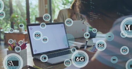 Image of data processing, 6g icons over caucasian girl writing by laptop at desk