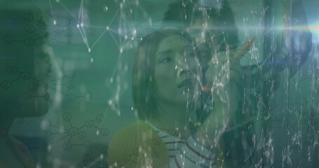 Image of diverse data over male doctor with changing tree talking on lights