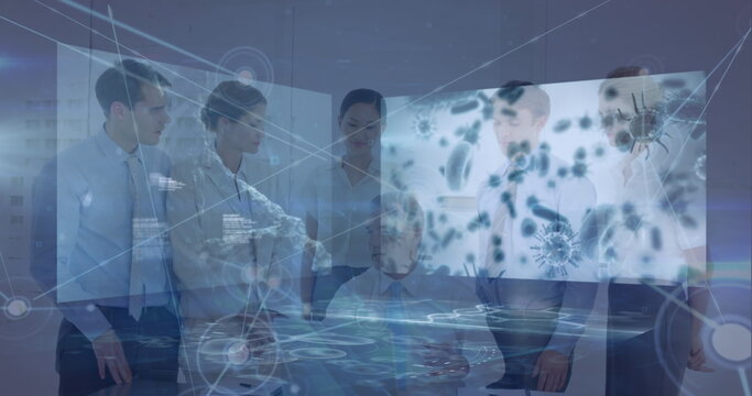 Image of blood cells, text over multiracial coworkers talking with male manager in meeting