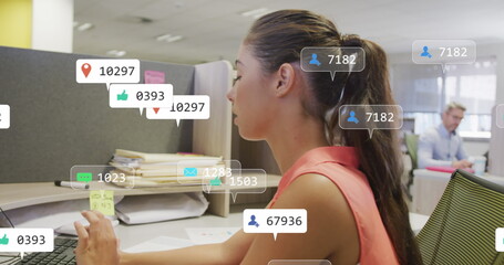 Image of social media notifications processing data over caucasian woman working at office desk