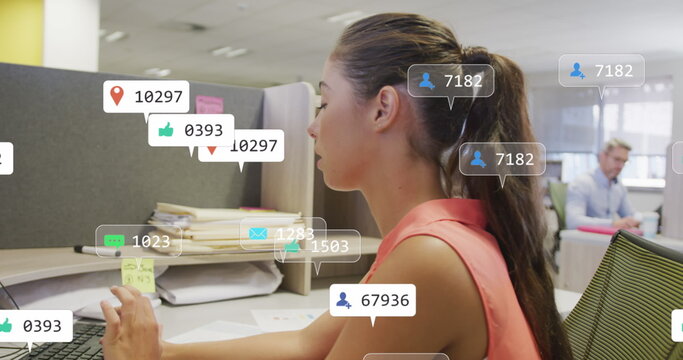 Image of social media notifications processing data over caucasian woman working at office desk