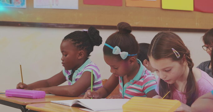 Image of glowing light over diverse school children in classroom