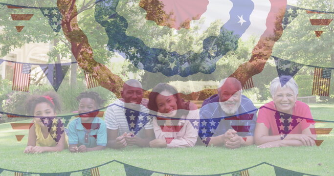 Image of flag of usa over african american family in garden