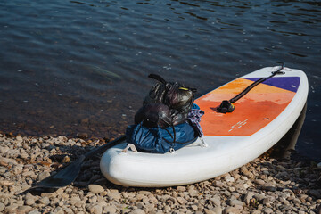 Enjoy an Adventurous Paddleboarding Experience on a Tranquil Waterway that offers a perfect balance...