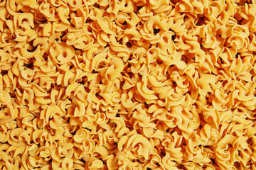 Raw Yellow Curly Pasta Texture Full Frame
