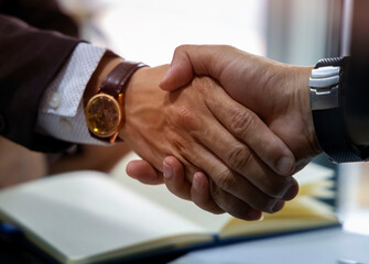 Businessteam of deal which handshake man and Success concept of handshaking after successful deal job