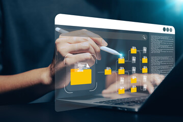 A businessman's hand interacting with a dynamic virtual network, represented by glowing lines and points, with a central abstract element symbolizing data flow, global connectivity, and cybersecurity.