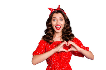 Pretty lady holding arms in heart figure expressing safety cardiology wear red dress isolated purple background