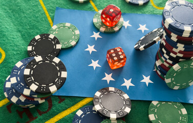 Dice, chess pieces, playing cards, wooden checkers and dominoes for board games on a light table. flag of the European Union
