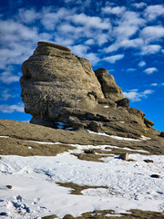 Sphinx in Bucebi Mountains in Romania in the winter 