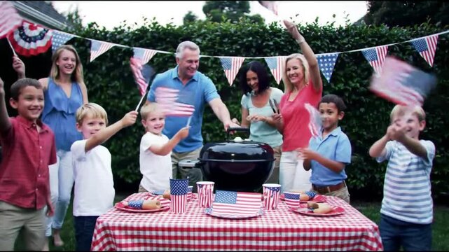 Happy 4th July celebration with American flags and food. Ideal for Independence Day marketing campaigns, social media posts, and event promotions.