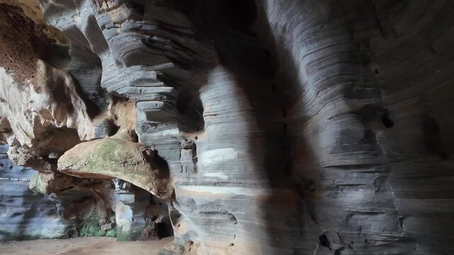 Beautiful scenery inside a cave in Thailand. This cave is formed by layering rocks with beautiful patterns and colors. Blue Cave