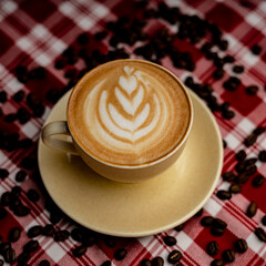 coffee latte with coffee beans in the background
