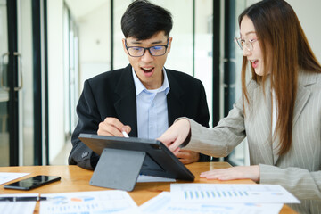 Young business entrepreneurs celebrating a success