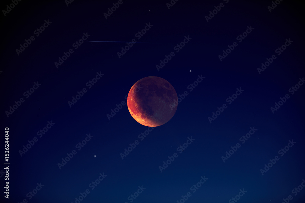 Canvas Prints lunar eclipse with stars and planets on the evening sky.