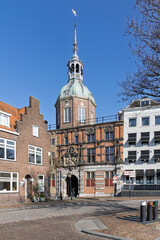City Great Main Gate "Groothoofdspoort". Architecture and vibrant atmosphere of a Dutch city Dordrecht, Netherlands. 16 March 2025.