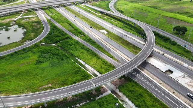 Drone footage of a complex bridge intersection multiple highway numbers 290 and 304 Nakhon Ratchasima Thailand