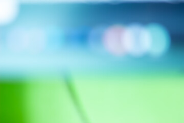 blue and green blurred backdrop wallaper. bokeh light christmas effect background.