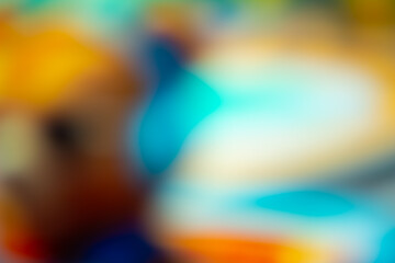 multicolored blurred abstract backdrop. soft blue with light orange bokeh background.