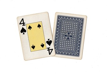 A pair of vintage playing cards with one card revealed on a white background.