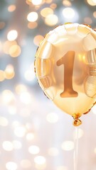 Golden balloon with number background celebrating a first anniversary or birthday against a sparkling bokeh one