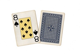 A pair of vintage playing cards with one card revealed on a white background.